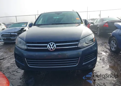 2012 Volkswagen Touareg Vr6 Executive z USA, uszkodzony, nr VIN WVGEF9BP4CD006881